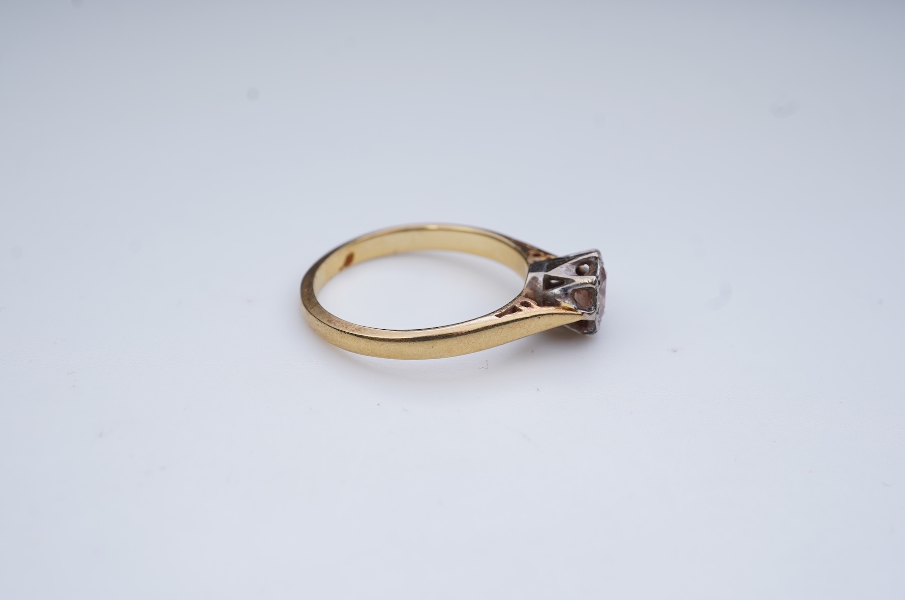 A diamond solitaire ring